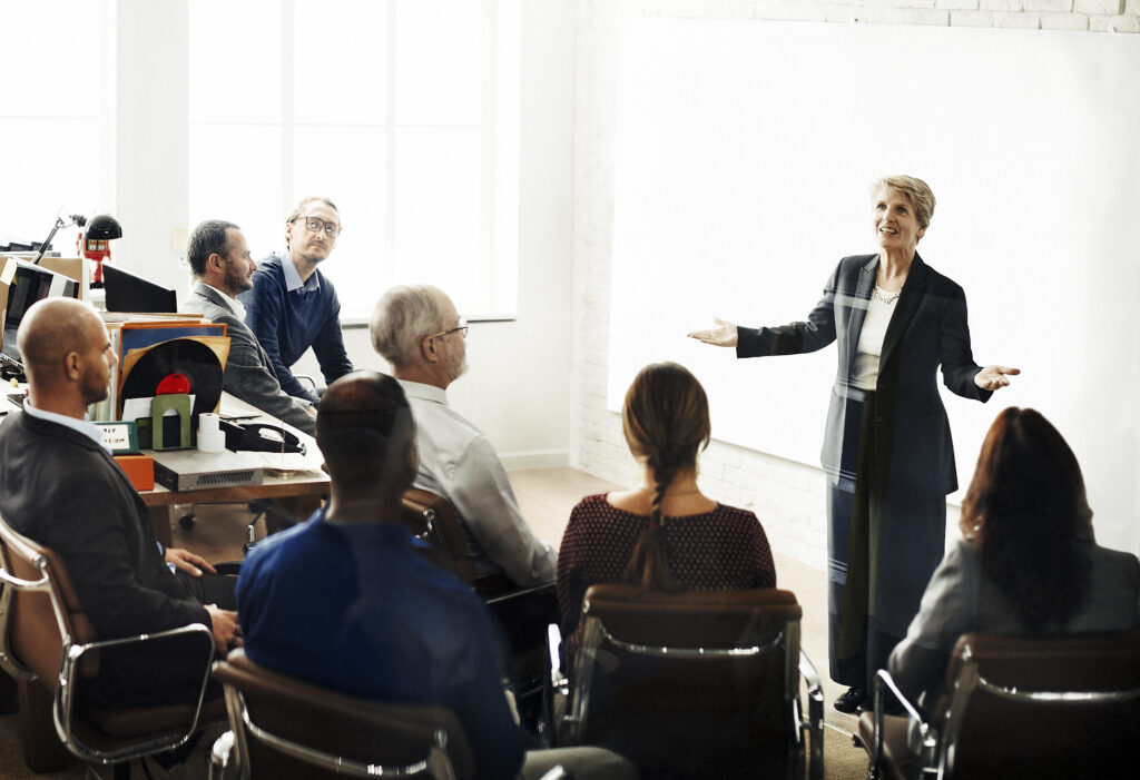 Group of professionals attending a leadership skills training.